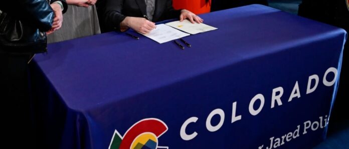 Colorado Governor Jared Polis gun control law